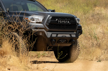Load image into Gallery viewer, DV8 MTO SERIES WINCH FRONT BUMPER (FOR 2016-2023 TACOMA)