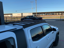 Load image into Gallery viewer, Rear view of Economy Roof Rack on a white Toyota Tacoma - Cali Raised LED