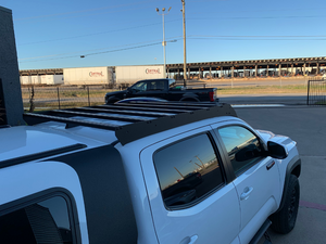 Rear view of Economy Roof Rack on a white Toyota Tacoma - Cali Raised LED